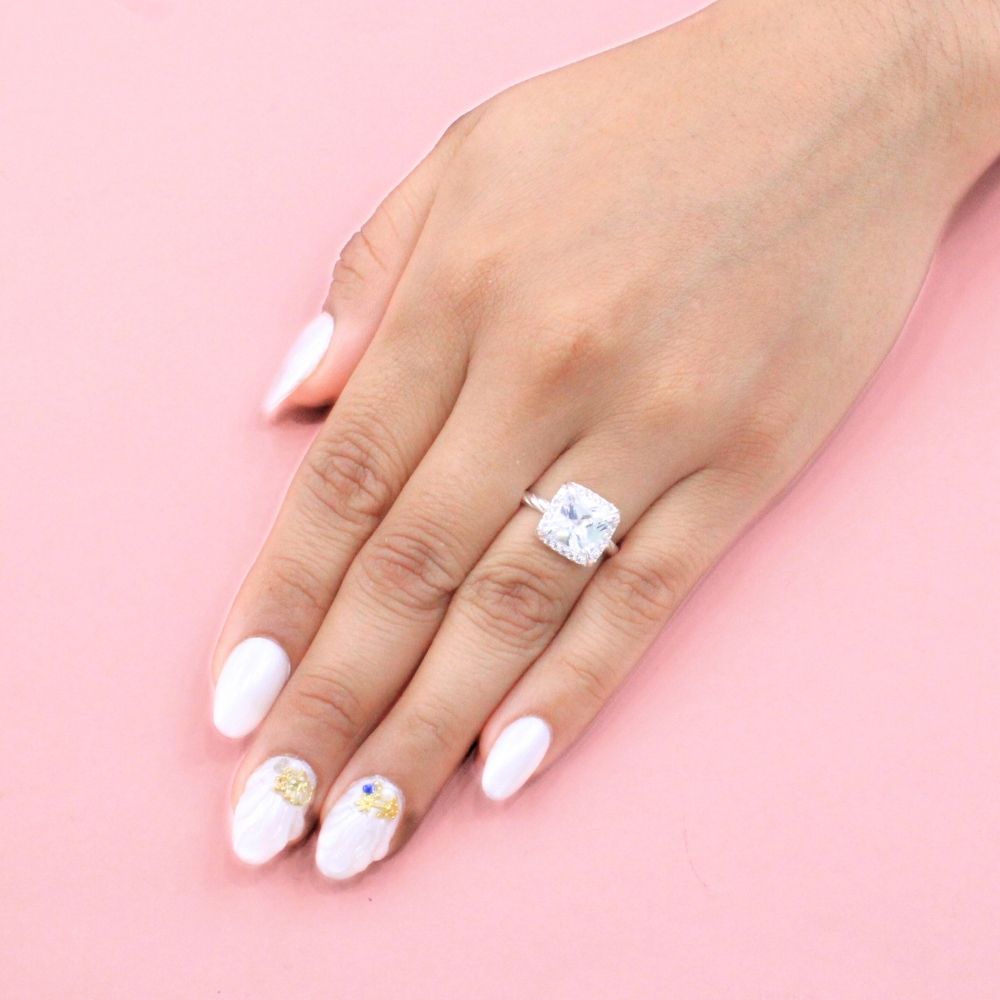 Anillo Solitario de Plata .925 Diseño Cuadrado con Uñas en Pico y Zirconias Brillantes mod. 1147
