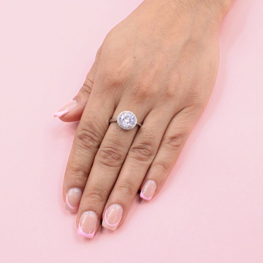 Anillo Solitario de Plata .925 Diseño Circular con Incrustación de Zirconias mod. 0999