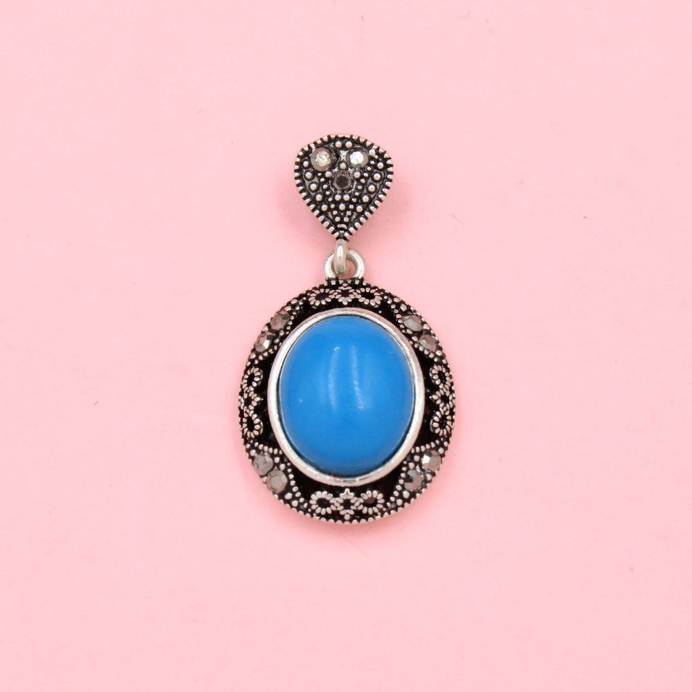 Dije de Dama Plata .925 Piedra Turquesa con Bisel de Marquesitas mod. 1153