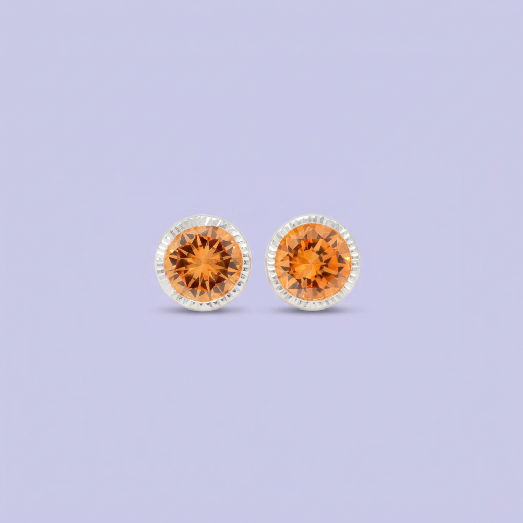 Broquel de Plata .925 Circular con Borde Plateado y Centro de Zirconia Naranja mod. 3056