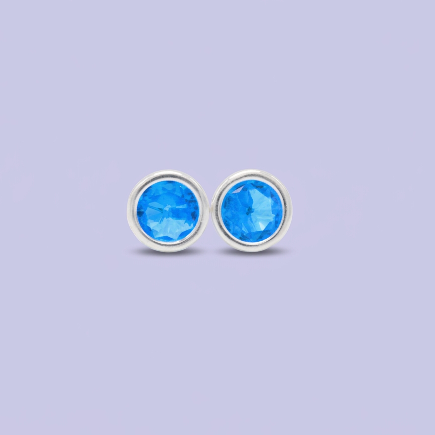 Broquel de Plata .925  Circular con Zirconia Azul Celeste mod. 3065