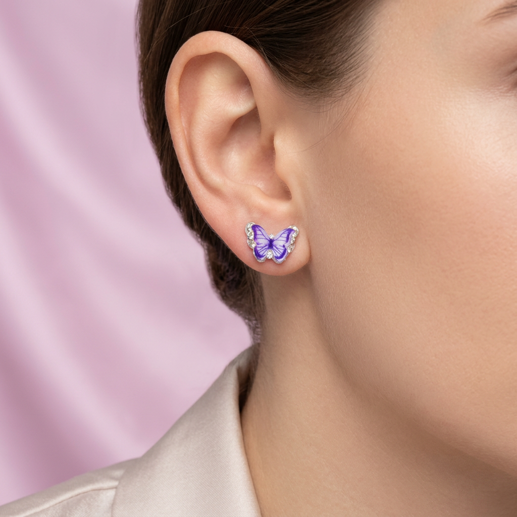 Arete de Plata .925. Mariposa Morada con Zirconia  mod.3191