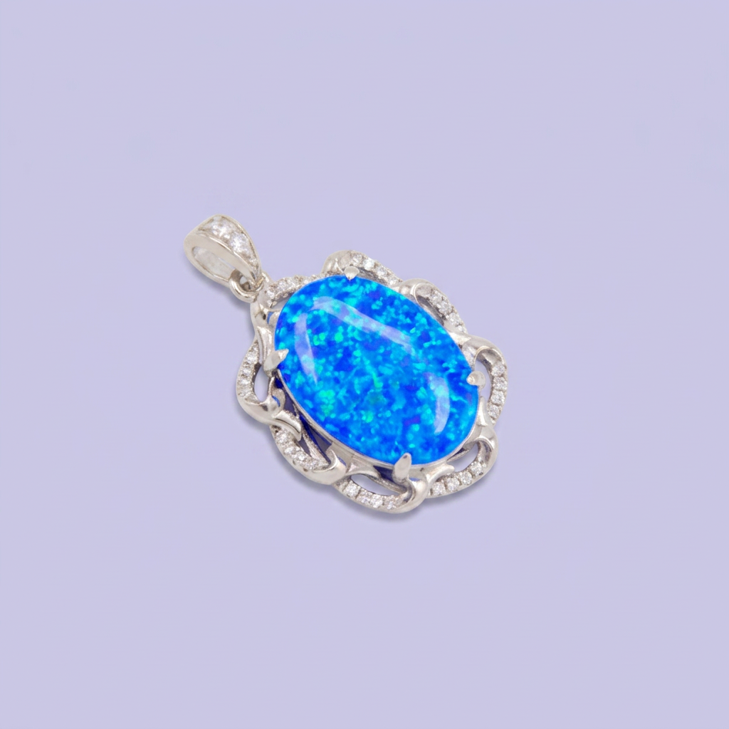 Dije de Plata .925 con Diseño Elegante Incrustado con Zirconias y Ópalo Azul mod. 2888