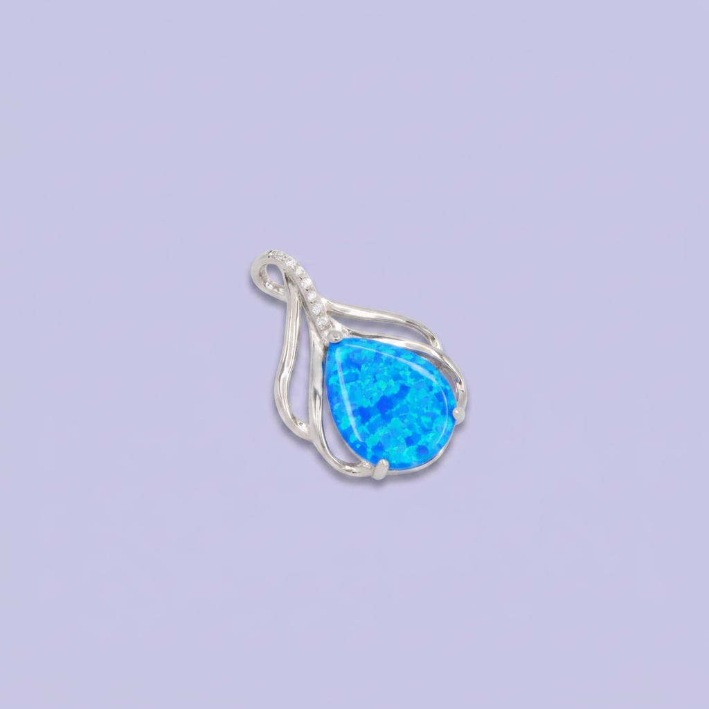 Dije de Plata .925 Diseño Especial de Gota Incrustado con Ópalo Azul mod. 2887