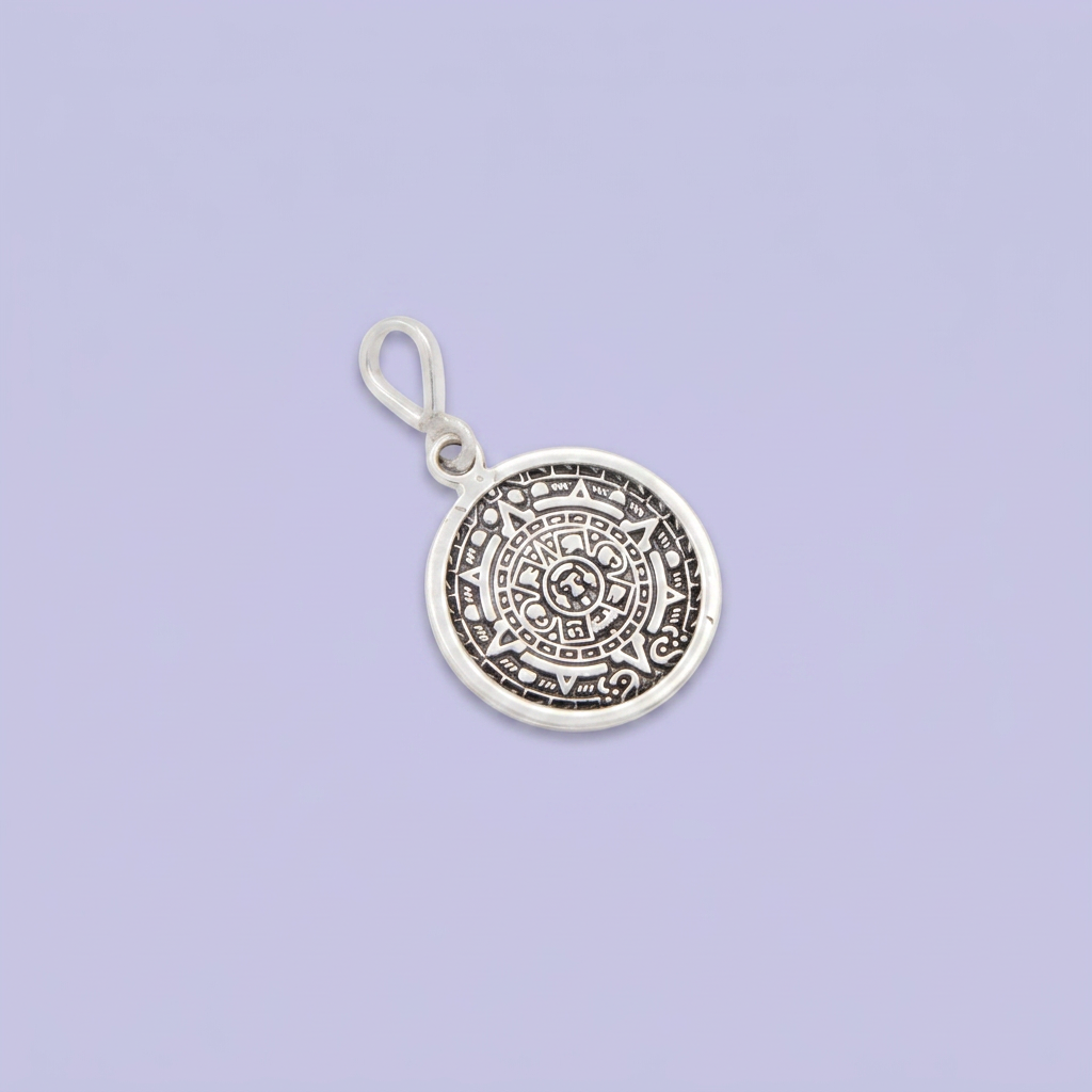 Dije de Plata .925 con Forma Pequeña Redonda y Figura del Sol Azteca mod. 2999