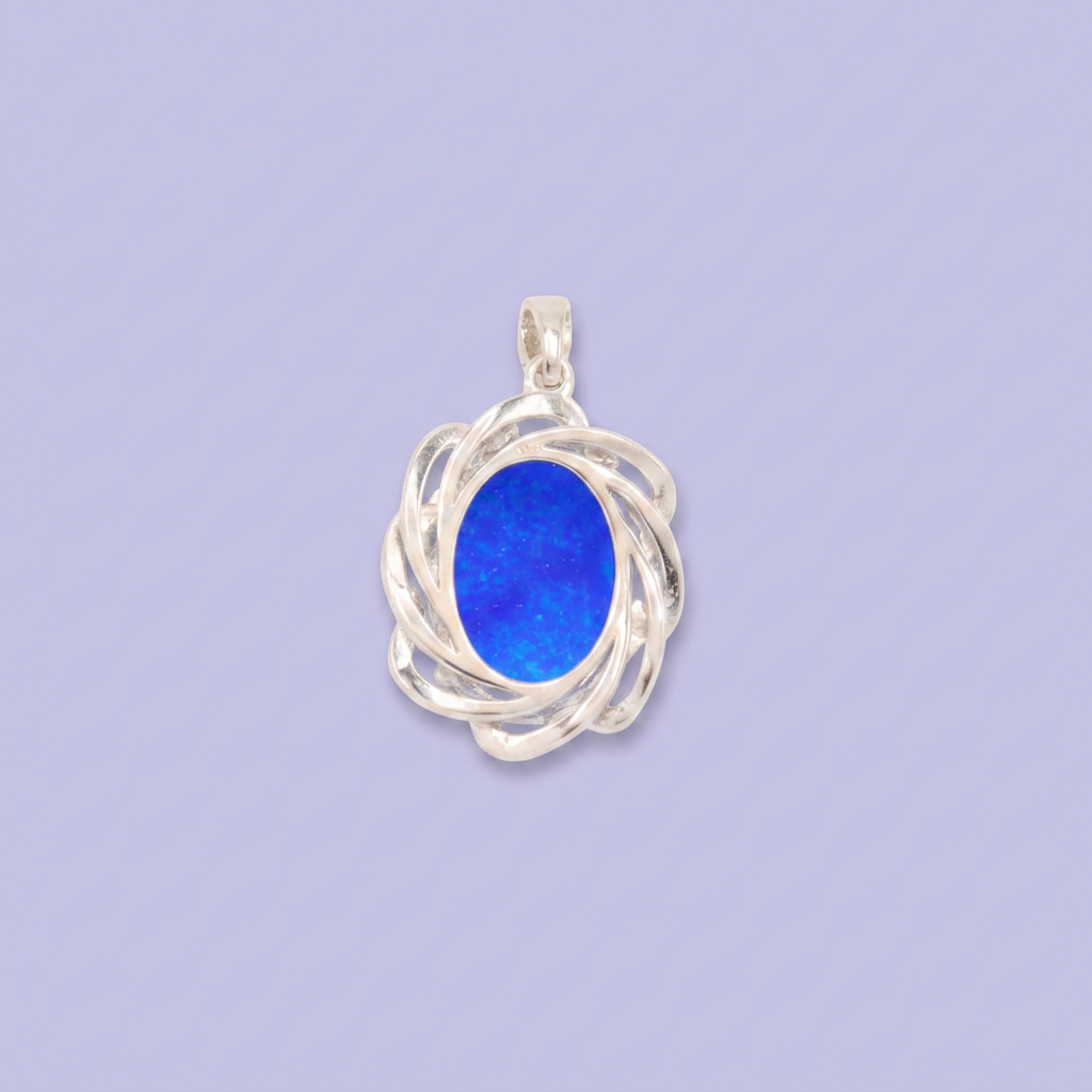 Dije de Plata .925 con Diseño Elegante Incrustado con Zirconias y Ópalo Azul mod. 2888