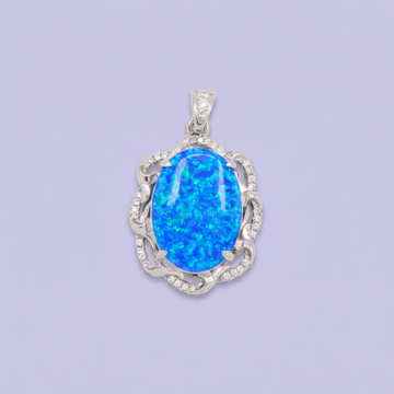 Dije de Plata .925 con Diseño Elegante Incrustado con Zirconias y Ópalo Azul mod. 2888