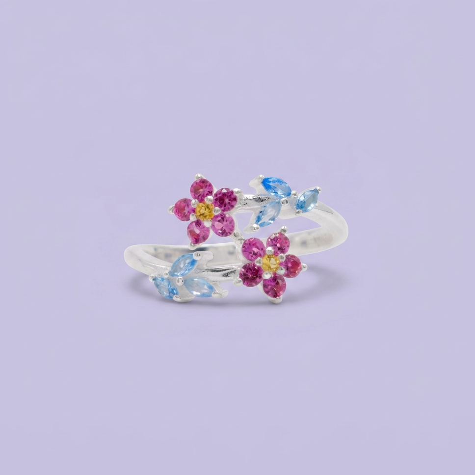 Anillo de Plata .9025 Doble Flor de Zirconia Fucsia y detalles en Azul Cielo mod. 2799