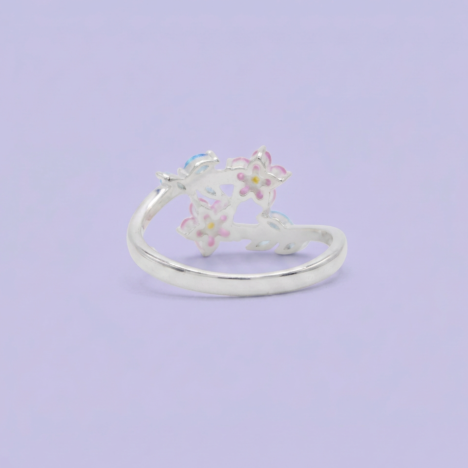 Anillo de Plata .9025 Doble Flor de Zirconia Fucsia y detalles en Azul Cielo mod. 2799