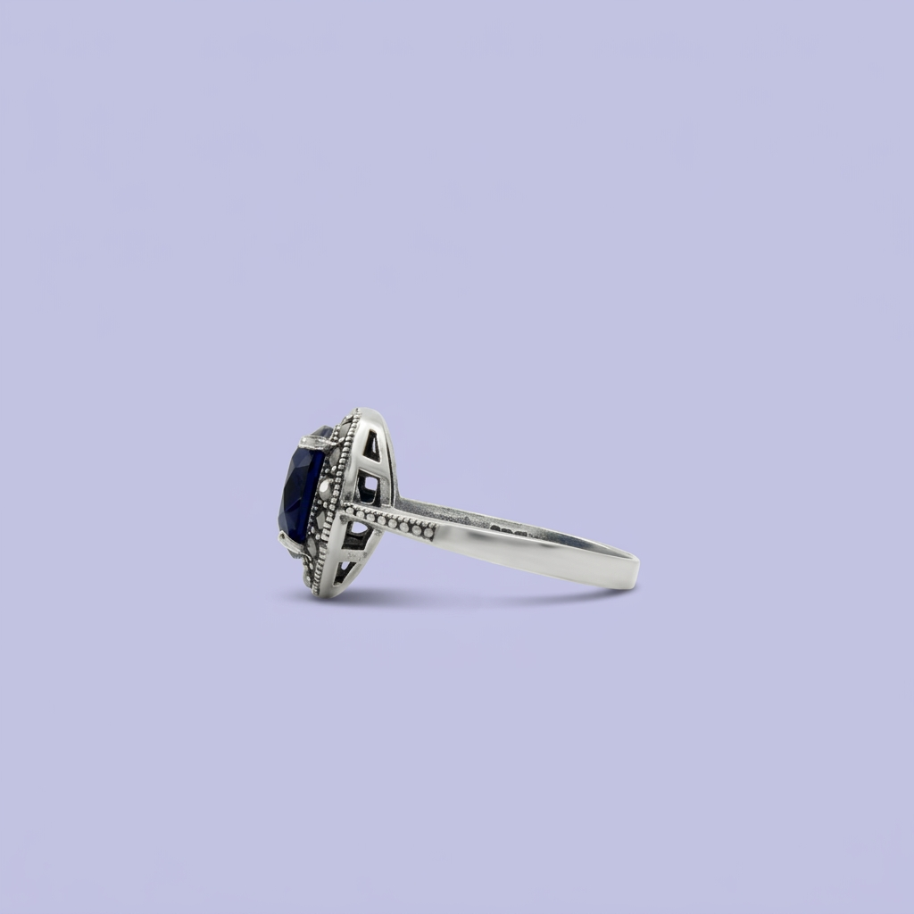 Anillo de Plata .925 Centro Zirconia Azul con Decorado de Marquesitas mod. 2254