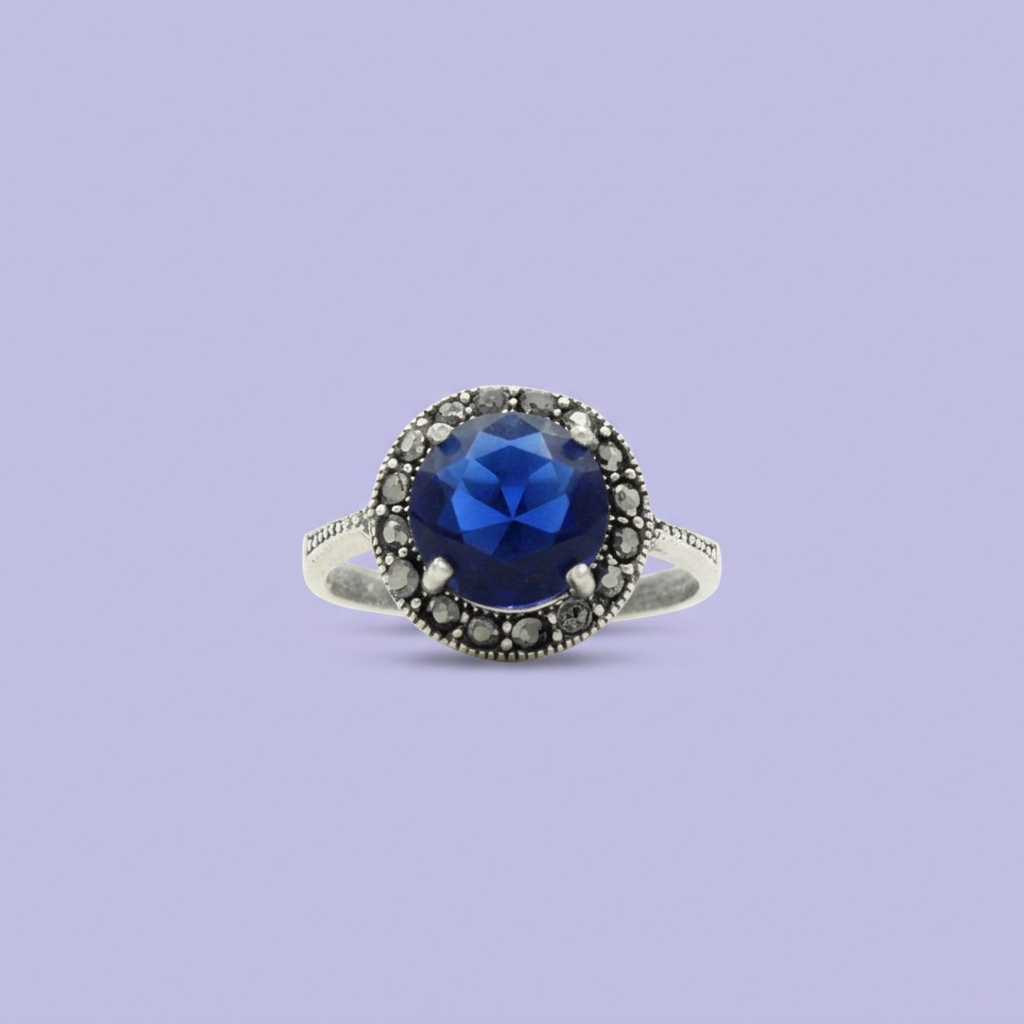 Anillo de Plata .925 Centro Zirconia Azul con Decorado de Marquesitas mod. 2254