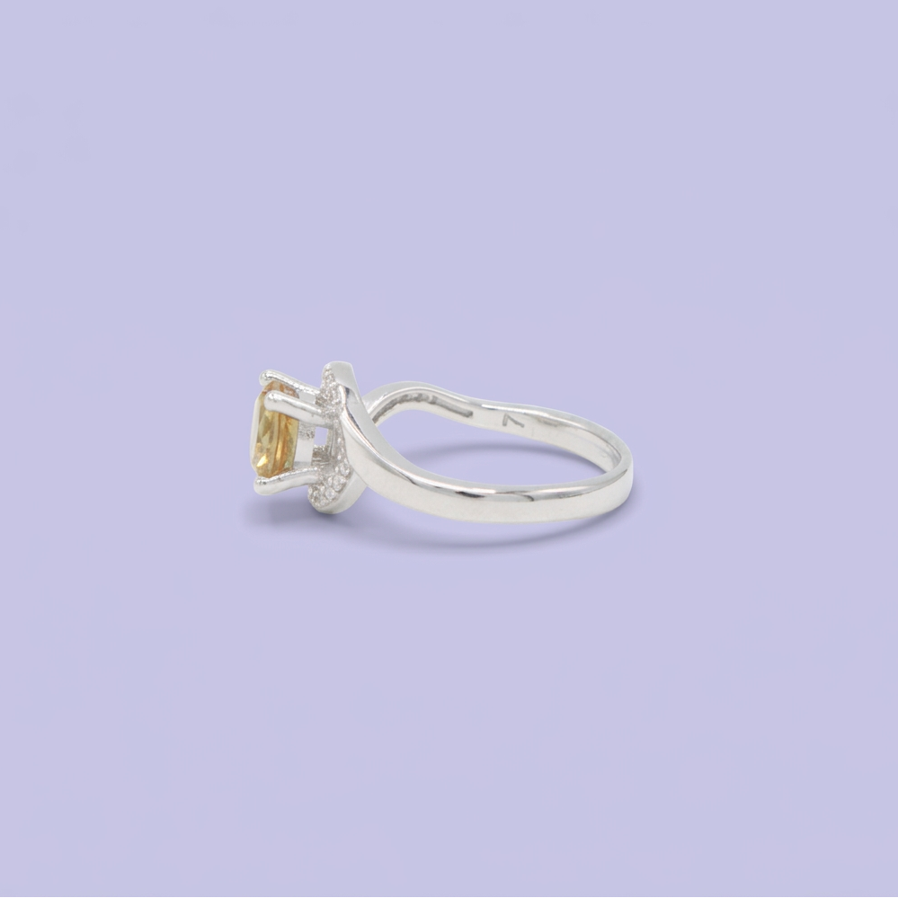 Anillo de Plata .925 con Diseño de Ola y Zirconia Verde Calido mod. 2928