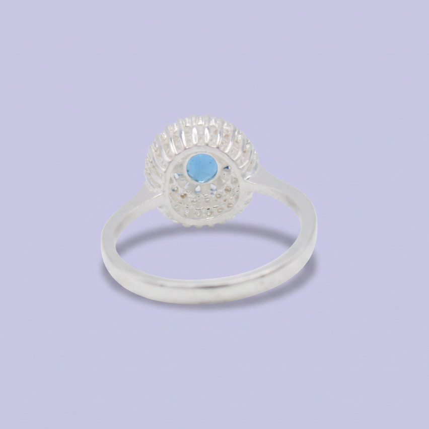 Anillo de Plata .925 con Diseño Circular con Zirconia Color Azul Cielo Central mod. 3103