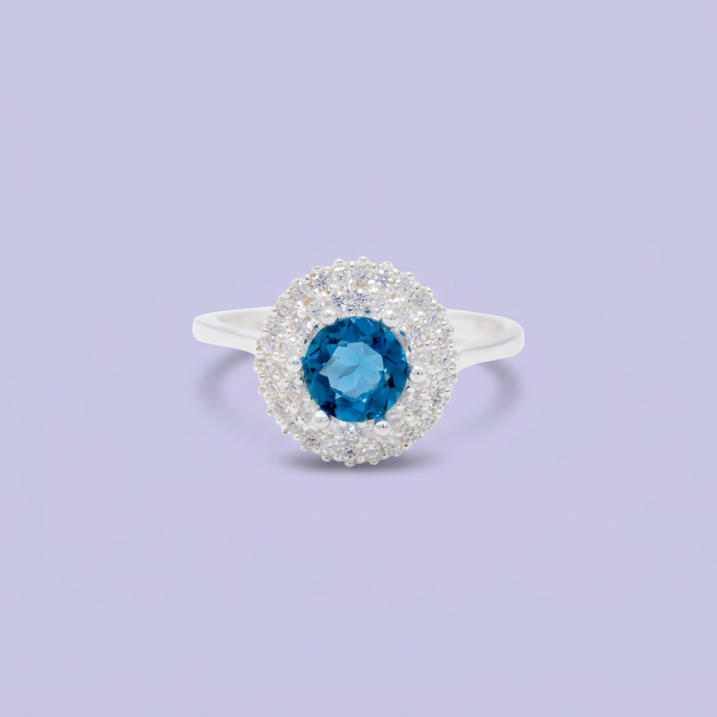 Anillo de Plata .925 con Diseño Circular con Zirconia Color Azul Cielo Central mod. 3103