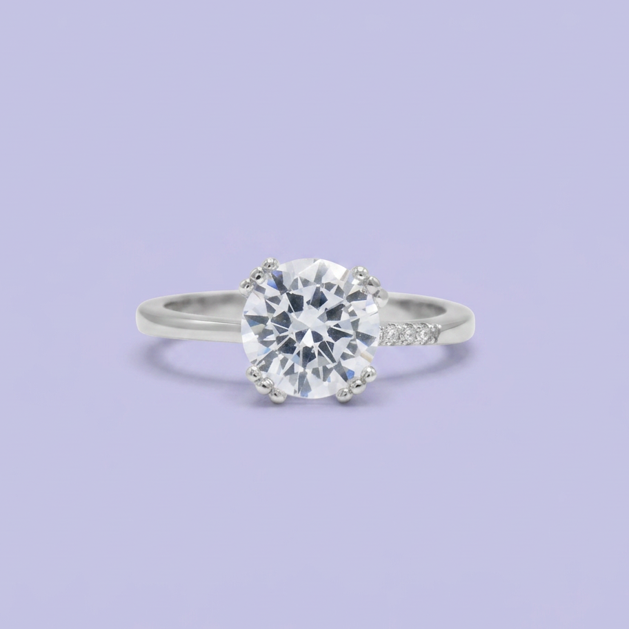 Anillo de Compromiso plata .925 con Zirconia Central y a un Costado mod. 2713