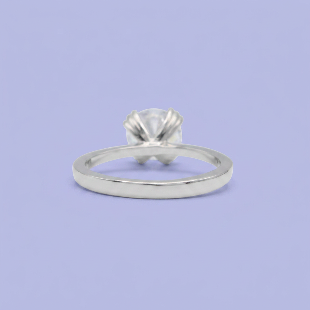 Anillo de Compromiso plata .925 con Zirconia Central y a un Costado mod. 2713
