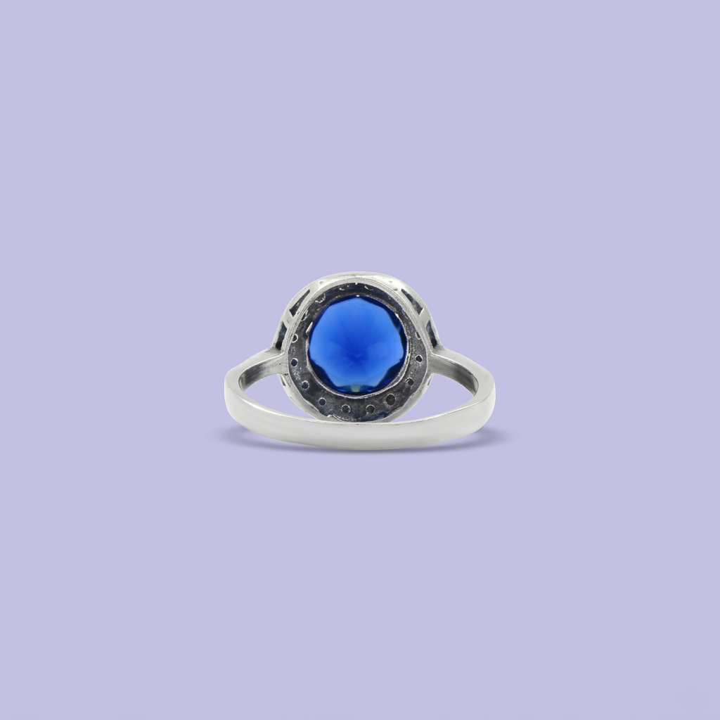 Anillo de Plata .925 Centro Zirconia Azul con Decorado de Marquesitas mod. 2254