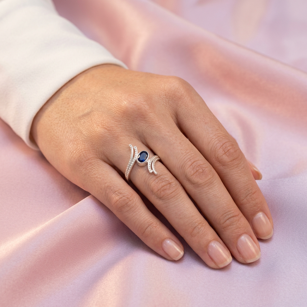 Anillo de Plata .925 Cruzado y Centro Oval con Zirconia Azul Rey mod. 3131