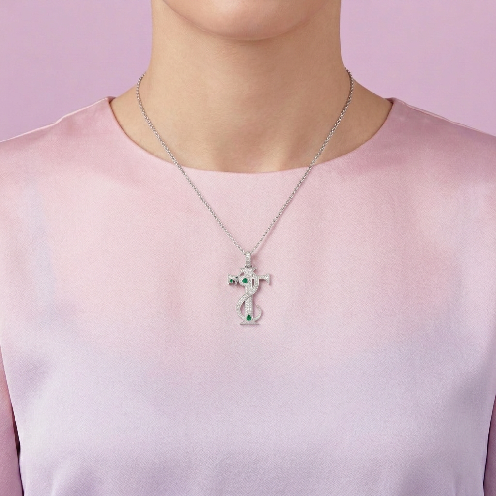 Dije de Plata .925 Cruz con Serpiente y Corazones con Zirconia Verde mod. 2882