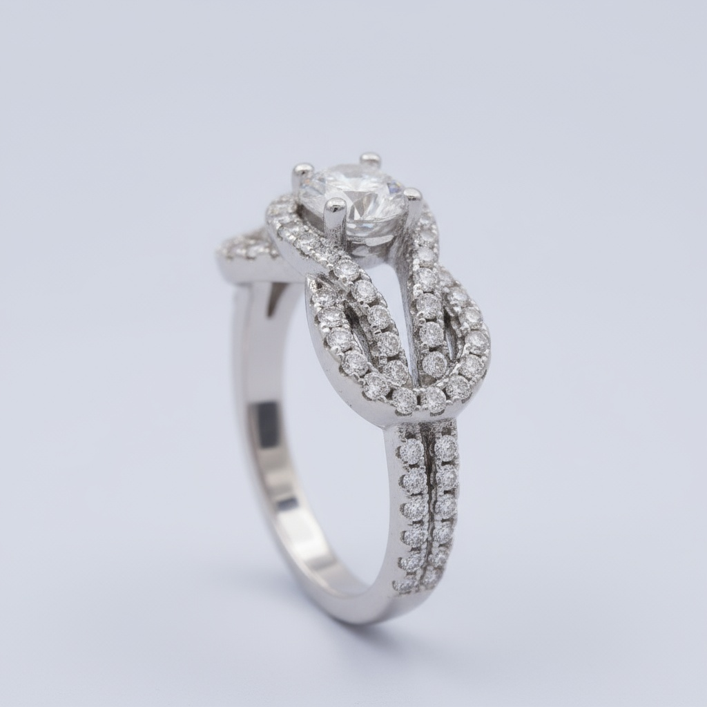 Anillo Solitario de Plata .925 Diseño de Lazo Detallado con Zirconias FInas mod. 1145