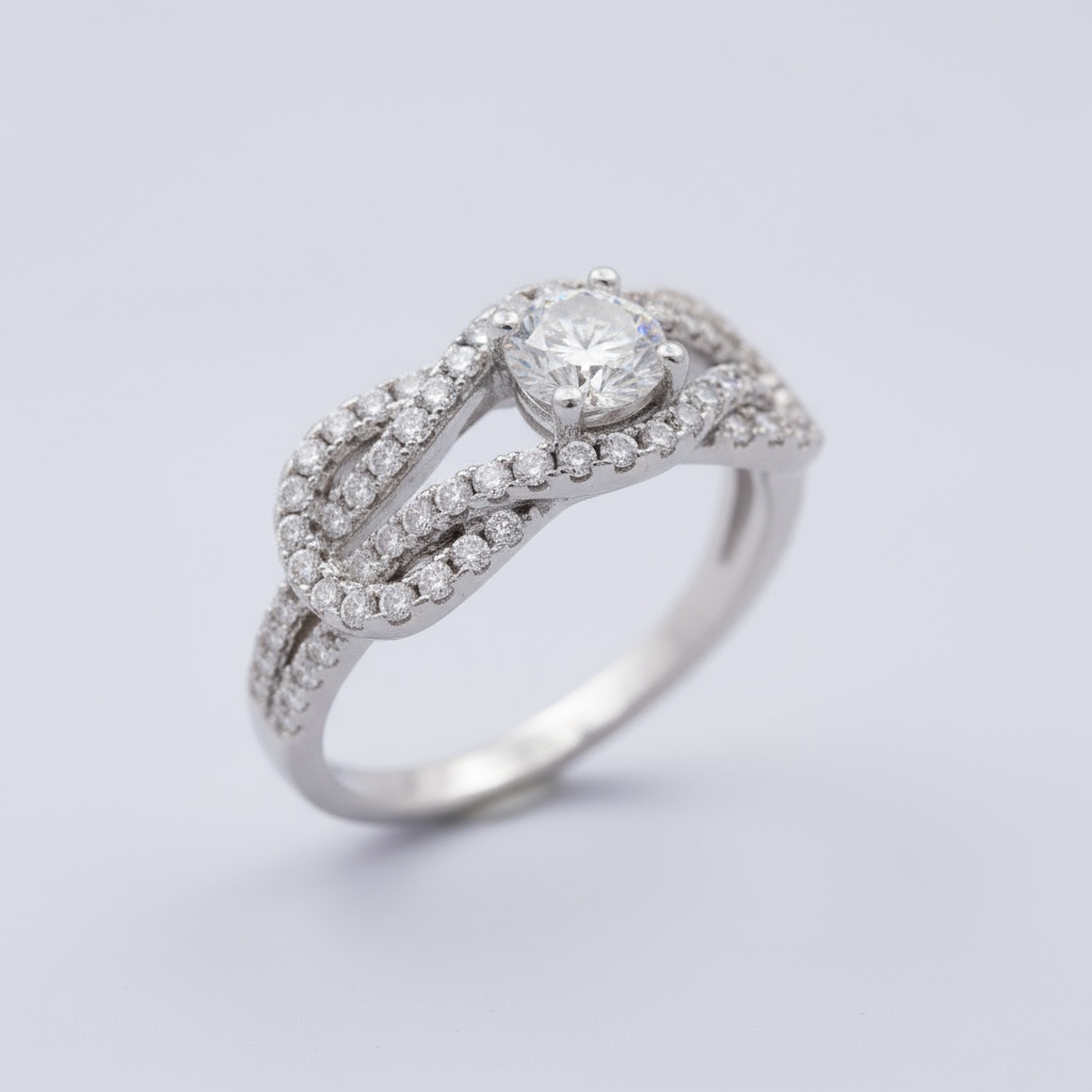 Anillo Solitario de Plata .925 Diseño de Lazo Detallado con Zirconias FInas mod. 1145