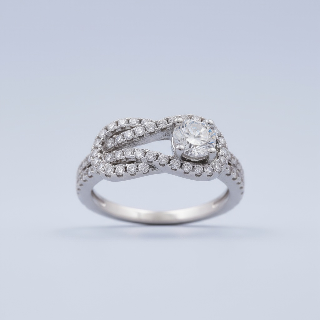 Anillo Solitario de Plata .925 Diseño de Lazo Detallado con Zirconias FInas mod. 1145