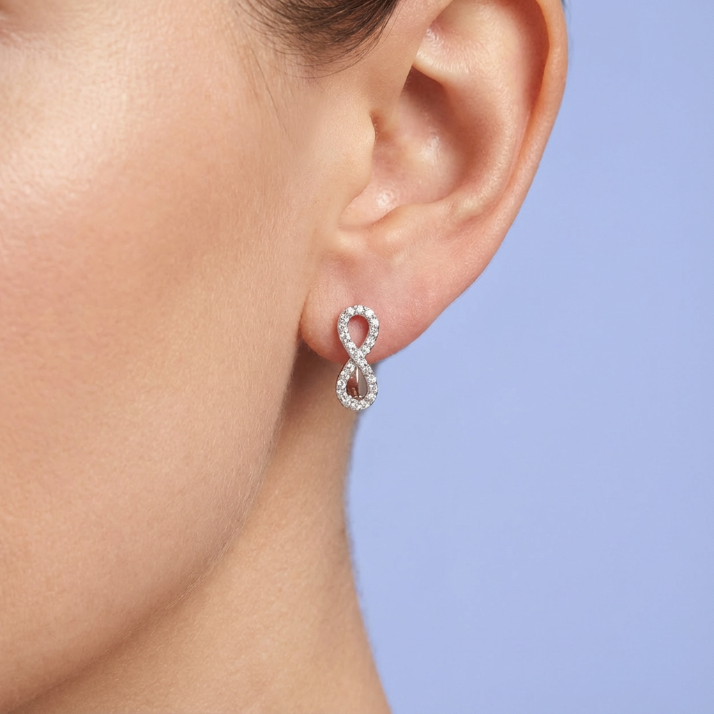 Grapa de Plata .925 Diseño de Infinito con Incrustación de Zirconias mod. 1636