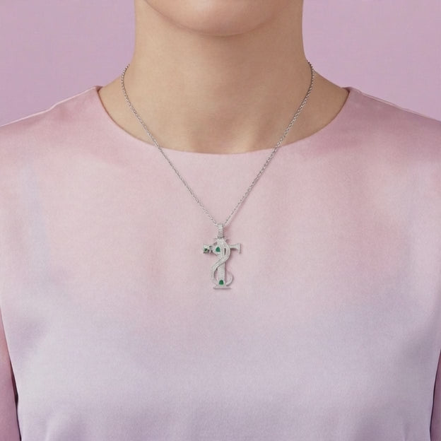 Dije de Plata .925 Cruz con Serpiente y Corazones con Zirconia Verde mod. 2882