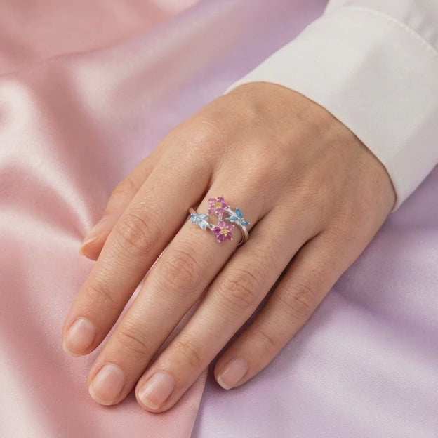 Anillo de Plata .9025 Doble Flor de Zirconia Fucsia y detalles en Azul Cielo mod. 2799