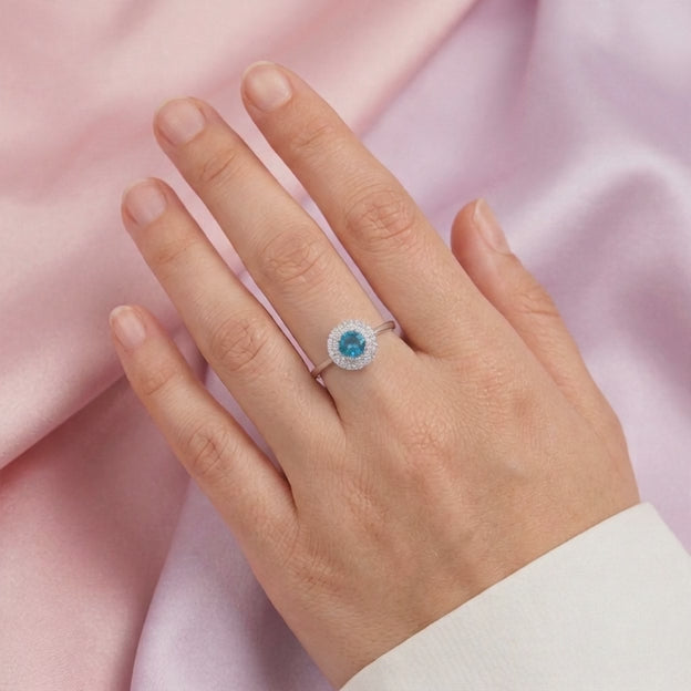 Anillo de Plata .925 con Diseño Circular con Zirconia Color Azul Cielo Central mod. 3103